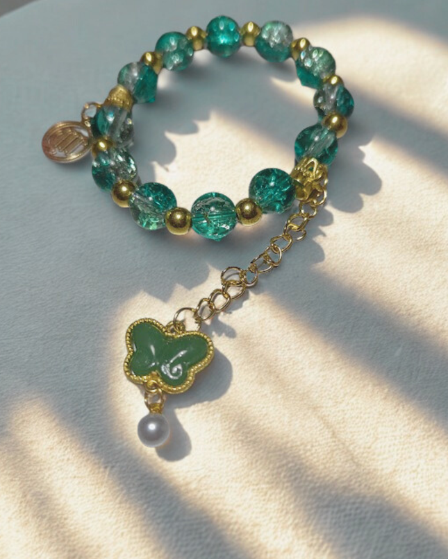 Teal Crackle Glass Butterfly Charm Bracelet with Virgo Charm & Pearl Drop (Gold-Tone)