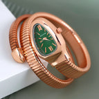Rose gold, green dial